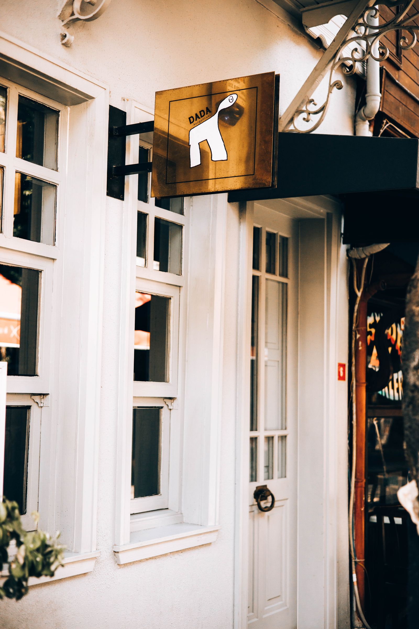 Shopfront with a projecting business sign